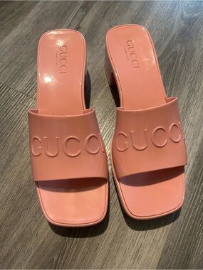 Gucci Pink Embossed Logo Slide Mules
